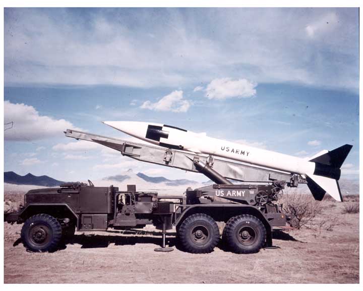 honest john rocket transported in an M35 military truck